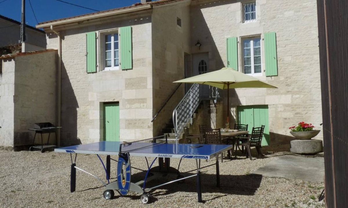 Asnieres-sur-Nouere Cottage | Charming Riverside Cottage with Terrace, Bikes, and Electric Car Charging