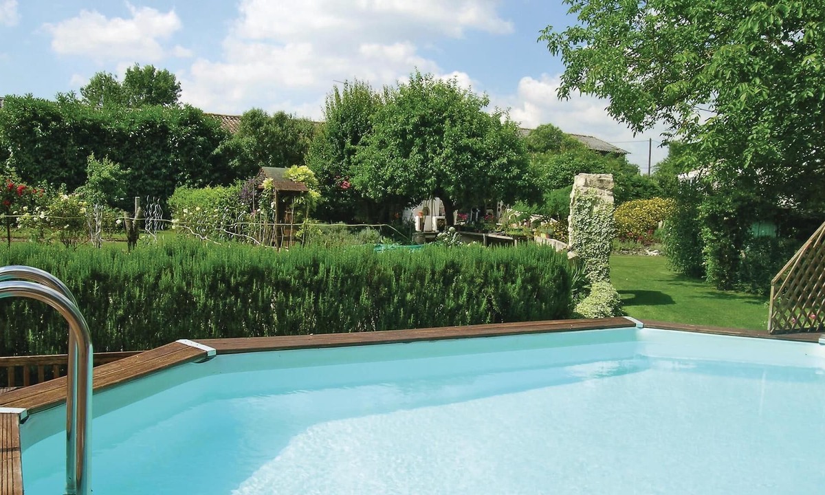 Marigny House | Enjoy the comfort in this beautiful vacation home with community pool.