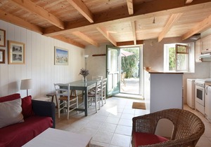 Charming Village House with Garden near Beach - 2BR, Modern Amenities, BBQ & Parking