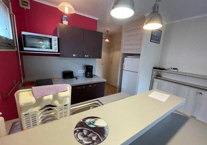 Quiet studio steps from the beach with balcony and garage