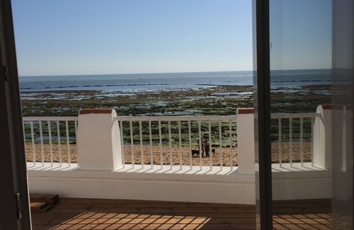 La Cotiniere Villa | villa feet in water sleeps 12 living room living room kitchen sea view 5 bedrooms
