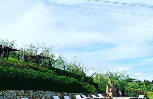 Santa Cristina a Mezzana Bed & Breakfast | Alessio room overlooking the vineyards of Tuscany