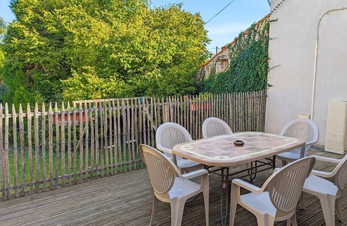 Asnieres-sur-Nouere Cottage | Charming Riverside Cottage with Terrace, Bikes, and Electric Car Charging