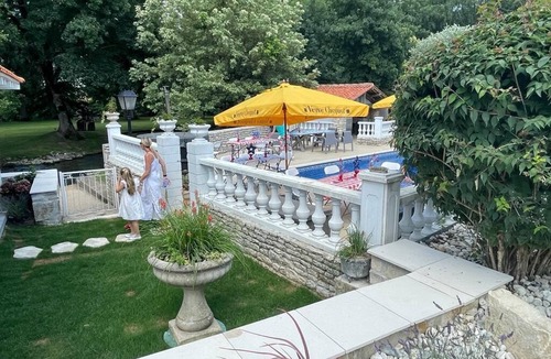 Chenon House | Charming updated and 4-bedroom mill house on the river with fantastic views.