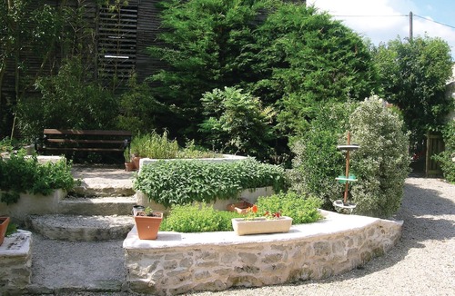 Marigny House | Enjoy the charm of this large yet cozy cottage with swimming pool in the communal garden.
