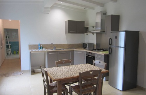 Coutras House | House in a green setting