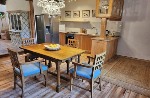 Celles Cottage | Le Grenier, a charming gîte on the side of a hill. Stunning views, stunning pool