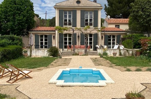 Est House | Lovely, quiet family home with terrace, garden and swimming pool. Near center