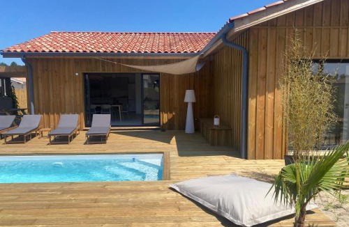 Lit-et-Mixe Villa | Maison en bois avec piscine proche de la plage