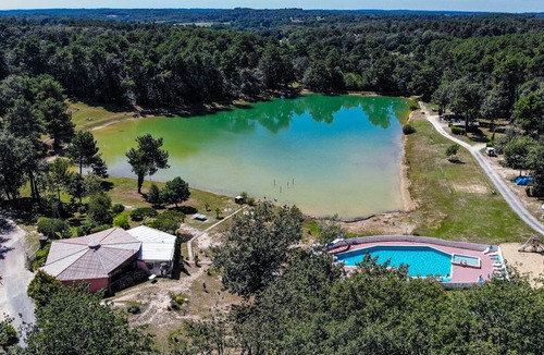 Douville House | Mobile home near a fishing pond