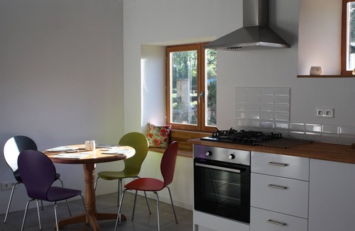 Soumeras House | Spacious, double height, beamed main space. This gite is in a rural setting.