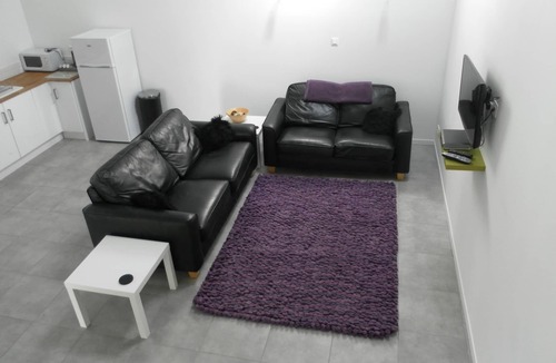 Soumeras House | Spacious, double height, beamed main space. This gite is in a rural setting.