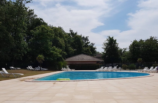 House in a wooded estate with swimming pool
