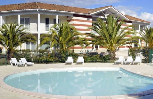 Vacation home in residence with swimming pool