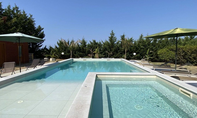 Cecina House | Wonderful private villa with private pool, A/C, WIFI, hot tub, TV, patio and pets allowed
