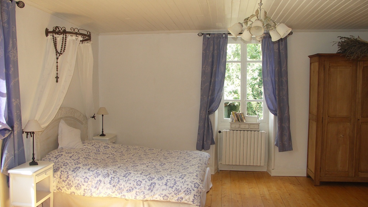 Photo of Bedroom in Saint-Aubin-de-Nabirat
